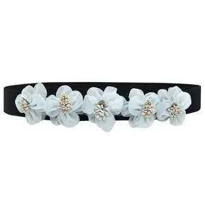 Women elastic belt with light blue fabric flowers, versatile decorative dress waist cinch.