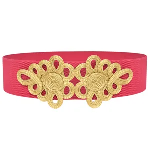 Detailed view of women's retro elastic waist belt with exquisite gold Chinese knot buckle.