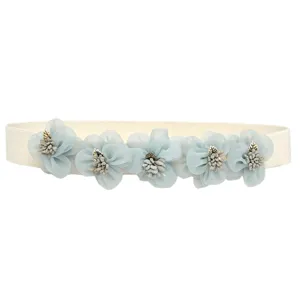 Elastic waist belt for women, floral stretch cincher dress accessory with blue flowers.