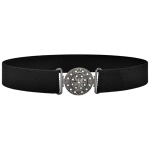 Close-up of black elastic waist belt featuring a sparkling rhinestone round metal buckle.