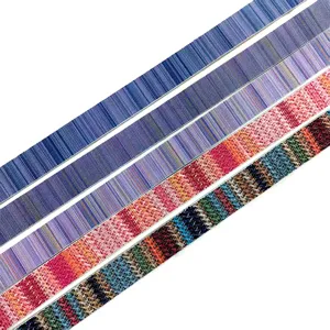 Colorful woven fabric belt straps detail display, stylish striped and tweed patterns for women.