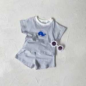 Infant summer clothing set featuring a blue whale print and striped short sleeve top.