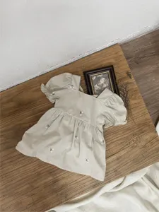 Details of girls summer cotton embroidered puff sleeve dress, cute toddler daily wear style.