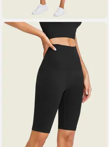 Pantalones cortos deportivos de fitness negros sin costuras de cintura alta y sujetador.