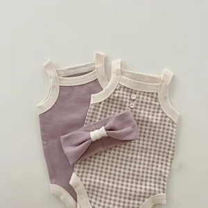Baby summer plaid romper set detail view, soft cotton baby bodysuit and headband.