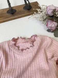 Infant baby girls pink ribbed long sleeve t-shirt detail, cute lettuce edge collar, soft toddler top.