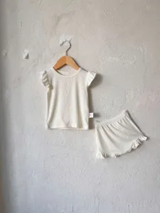 Summer baby cotton ribbed top and bloomer shorts set detail, soft fabric, cute ruffles.