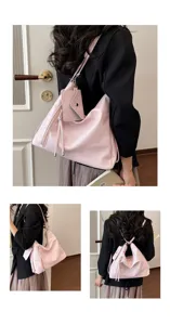 Elegante zaino rosa da donna multifunzione con piccola borsetta per uso quotidiano.