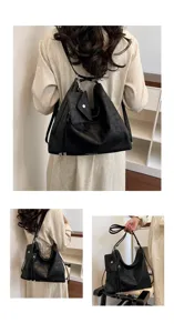 Elegante zaino e borsa a tracolla nera da donna, design versatile di grande capienza.