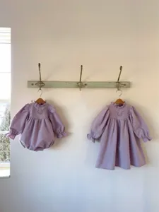 Charming baby girl autumn embroidered romper and dress set with frilly collar in soft purple.