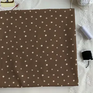 Brown star print fabric for DIY sewing, handmade crafts, and pastoral home tablecloths.