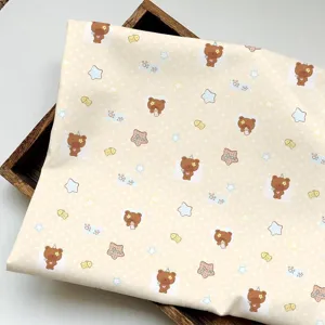 Cute cartoon bear print fabric, aesthetic desk decor cloth for student dorm room, cozy DIY material.
