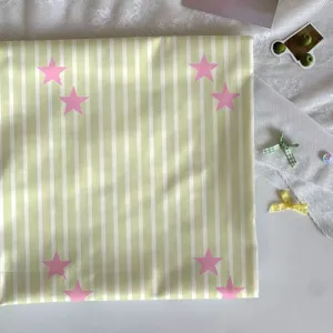 Green striped pink star fabric detail showing the fresh pastoral design, perfect for DIY handmade crafts.