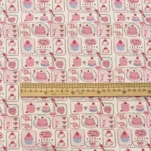 Detailed fabric texture shot, vintage cartoon dessert pattern printed cotton cloth material.