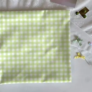 Green checkered fabric for DIY crafts, aesthetic table cloth and handmade textile decor.