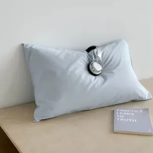 Detailed view of soft aesthetic pillow in calm blue tone, perfect cozy bedside decor accent.