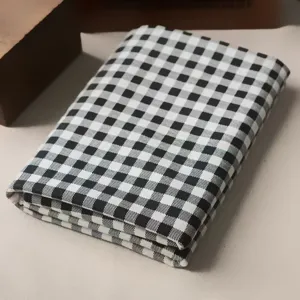 Black and white checkered fabric detail, perfect for DIY crafts, home decor and stylish desk tablecloths.