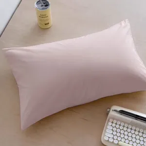 Detailed view of the soft pink decorative pillow, adding a cozy Korean style to your room.