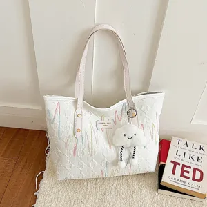 Elegante bolso de mano blanco con bordado colorido y bonito colgante de nube para mujeres.