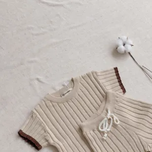Ensemble tricoté bébé manches courtes short bande contraste coton doux été détail
