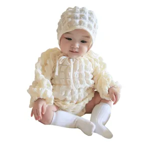 Cute newborn baby waffle romper set with hat and socks, soft breathable cotton infant clothes.