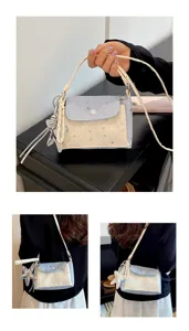 Chic mini star handbag for women, cute shoulder crossbody bag with star pendant, casual daily use.