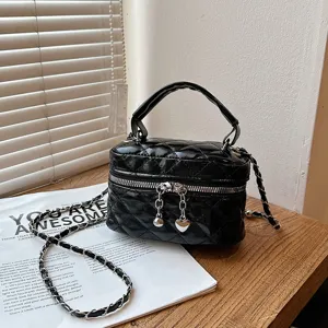 Black quilted mini vanity bag with chain strap and top handle chic crossbody handbag