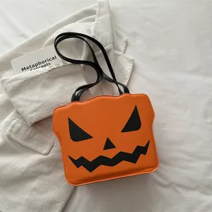 Detailed view of Halloween pumpkin shoulder bag, orange tote accessory for party and daily wear.