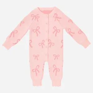 Cute pink baby knit romper with sweet bow prints, long sleeves and button front closure for infants.