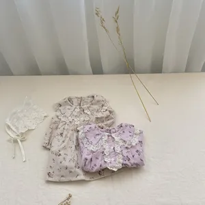 Girls floral long sleeve dress set with cute lace collar and matching bonnet detail shot.