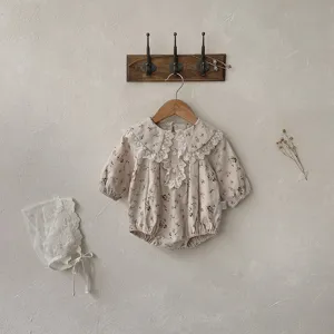 Cute baby girl floral romper set with lace collar and matching bonnet for autumn wear.
