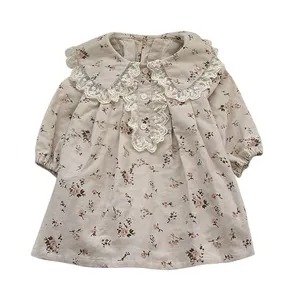 Charming long-sleeve baby girl floral dress featuring a delicate lace collar for autumn.