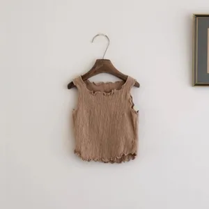 Girls summer solid color crinkled cotton sleeveless tank top with cute wavy ruffles.