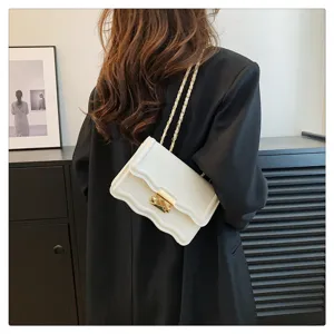 White wave-edged chain shoulder bag, stylish minimalist crossbody bag for women daily use.