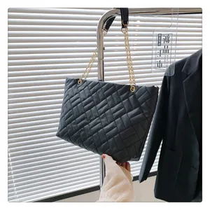 Stylish black quilted chain tote bag for women, large capacity retro shoulder bag daily use.