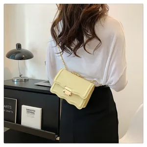 Stylish chain wavy small square bag for women, elegant leather crossbody shoulder bag.