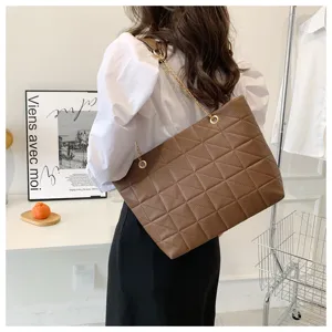 Stylish brown quilted tote bag for women featuring chic chain straps and spacious capacity.