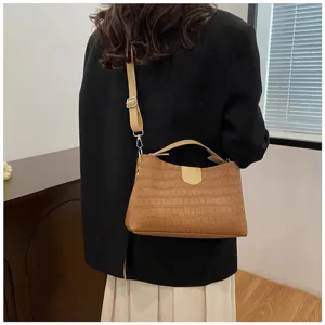 Brown crocodile pattern shoulder bag detail view, stylish women crossbody handbag with strap.