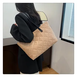 Large capacity quilted tote bag for women, casual stylish shoulder bag with soft padded design.