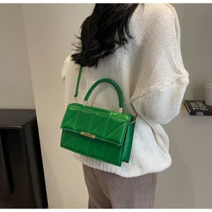 Green quilted crossbody bag for women, stylish PU leather shoulder bag with top handle.