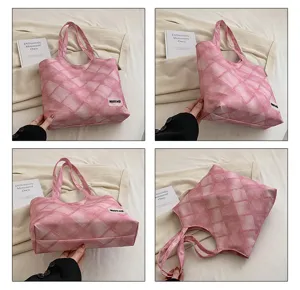 Pink canvas tote bag for women, large capacity shoulder bag with stylish grid pattern.