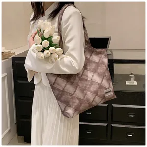 Detail view of a Korean style checkered tote bag, large capacity shoulder bag for daily use.