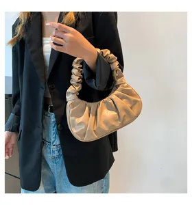 Women's pleated cloud shoulder bag, chic retro PU leather underarm dumpling handbag style.