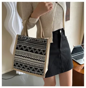 Ethnic style canvas tote bag with black and white geometric print for women daily use.