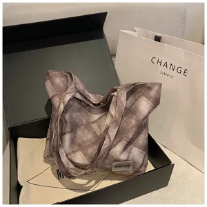 Large capacity casual canvas tote bag for women, vintage plaid shoulder bag daily use.