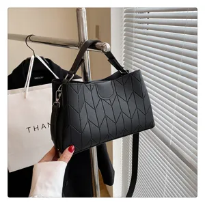 Black shoulder tote bag with chevron pattern, stylish casual handbag with top handle for women.