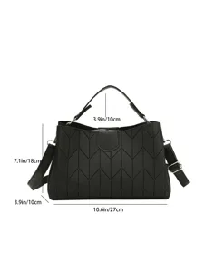 Detail view of black handbag with chevron quilting pattern and dimension markings for sizing.