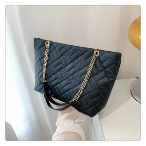 Chic black quilted tote bag with gold chain strap, stylish women's PU leather shoulder bag.