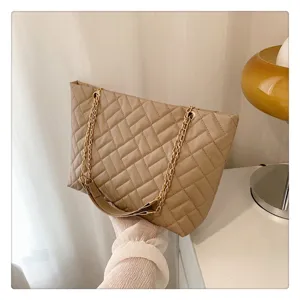 Beige quilted tote bag with chain strap, large capacity chic women shoulder bag for daily use.