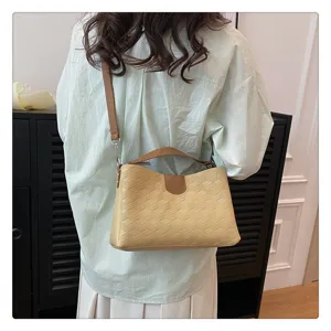 Women PU leather shoulder bag casual crossbody handbag with geometric texture for daily use.